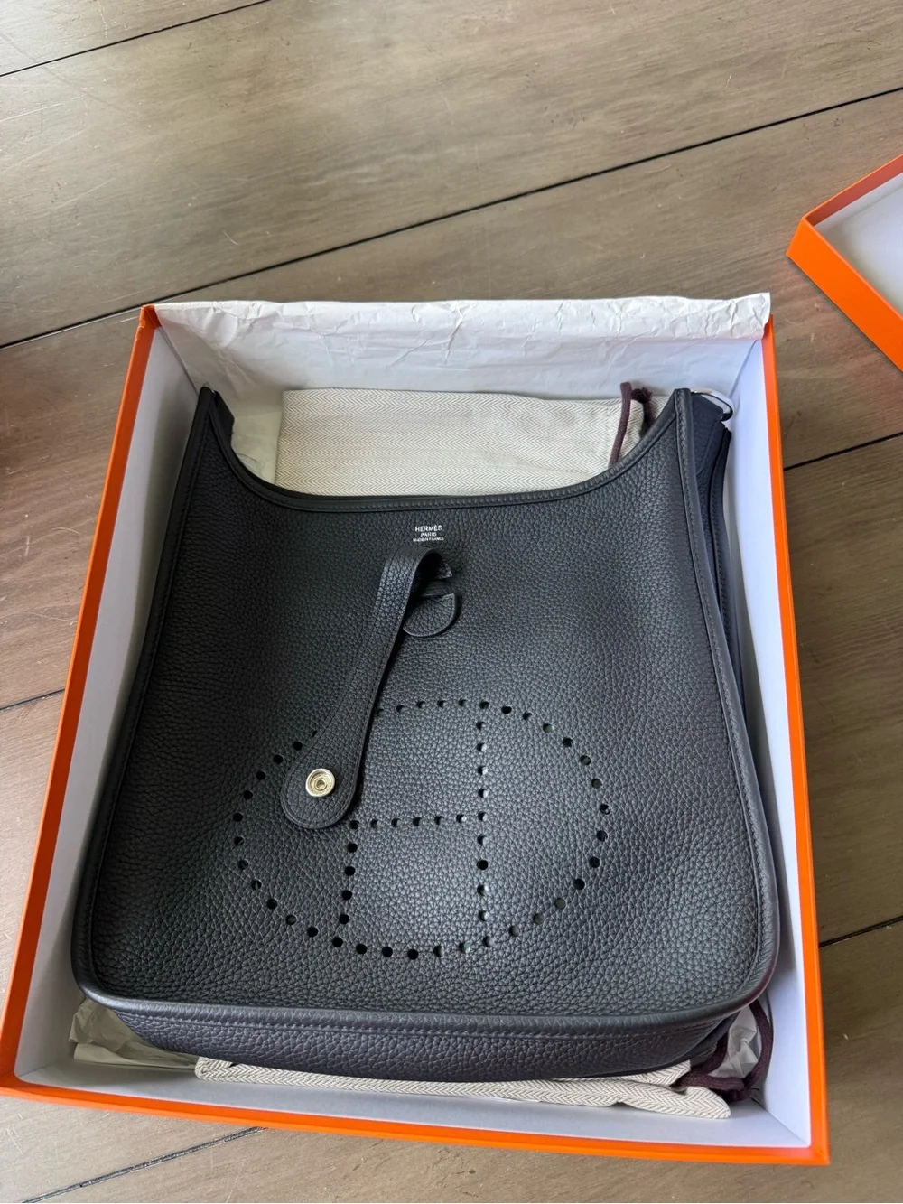 Evelyne Black Togo Leather Crossbody Bag